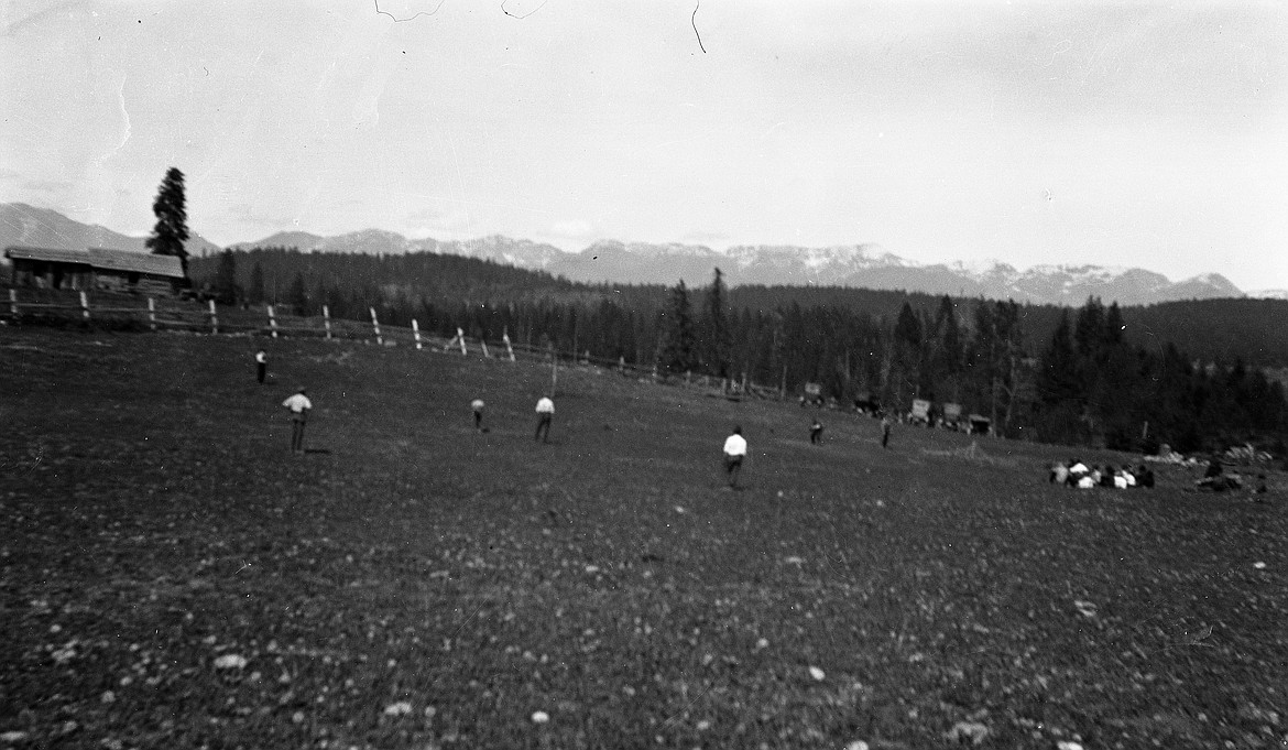 A baseball game on a decidedly uneven field near Kalispell in the early 1920s. (Vernon Weed photo)