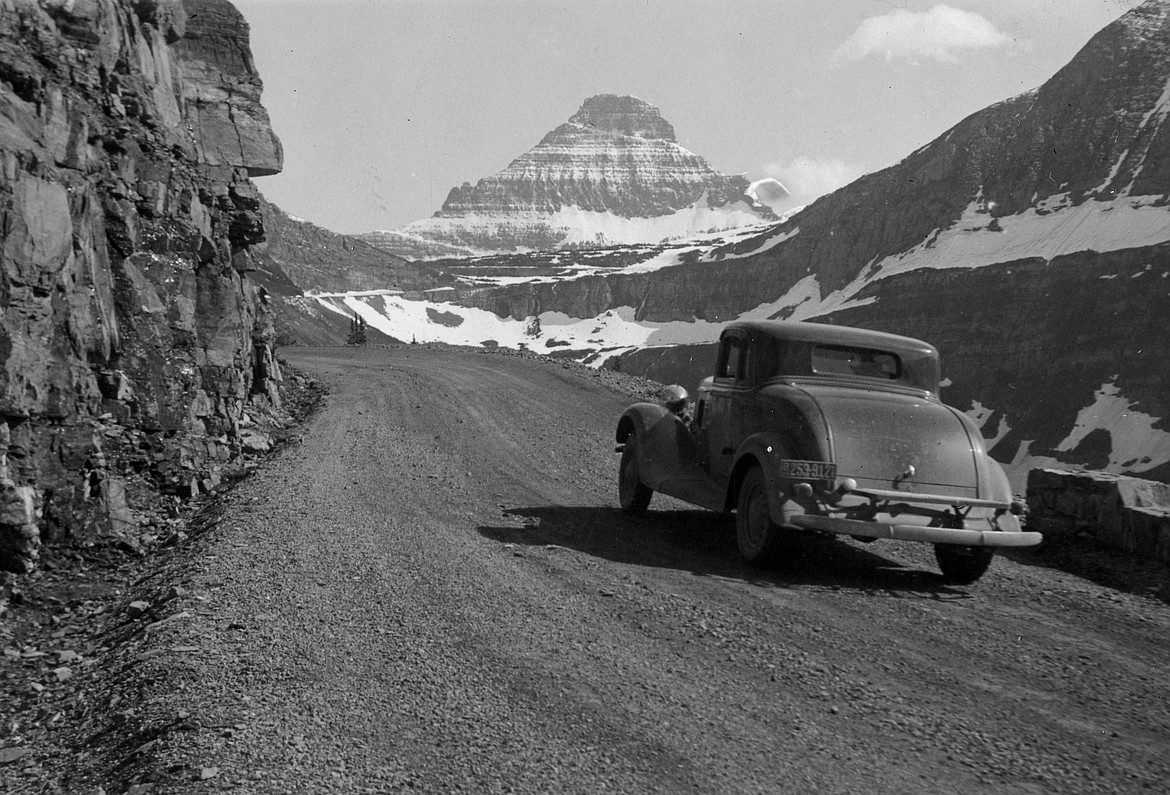 A car makes its way up Going to the Sun Road in the 1930s. (Vernon Weed photo)