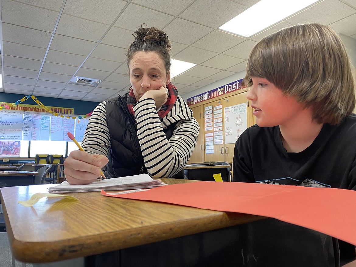 Betty Kiefer Elementary School fifth grader Brody Weitz works on his SMART goals and steps to achieve them with mom Tassie Magrath during the annual student-led conference Thursday morning. (Madison Hardy/Press)