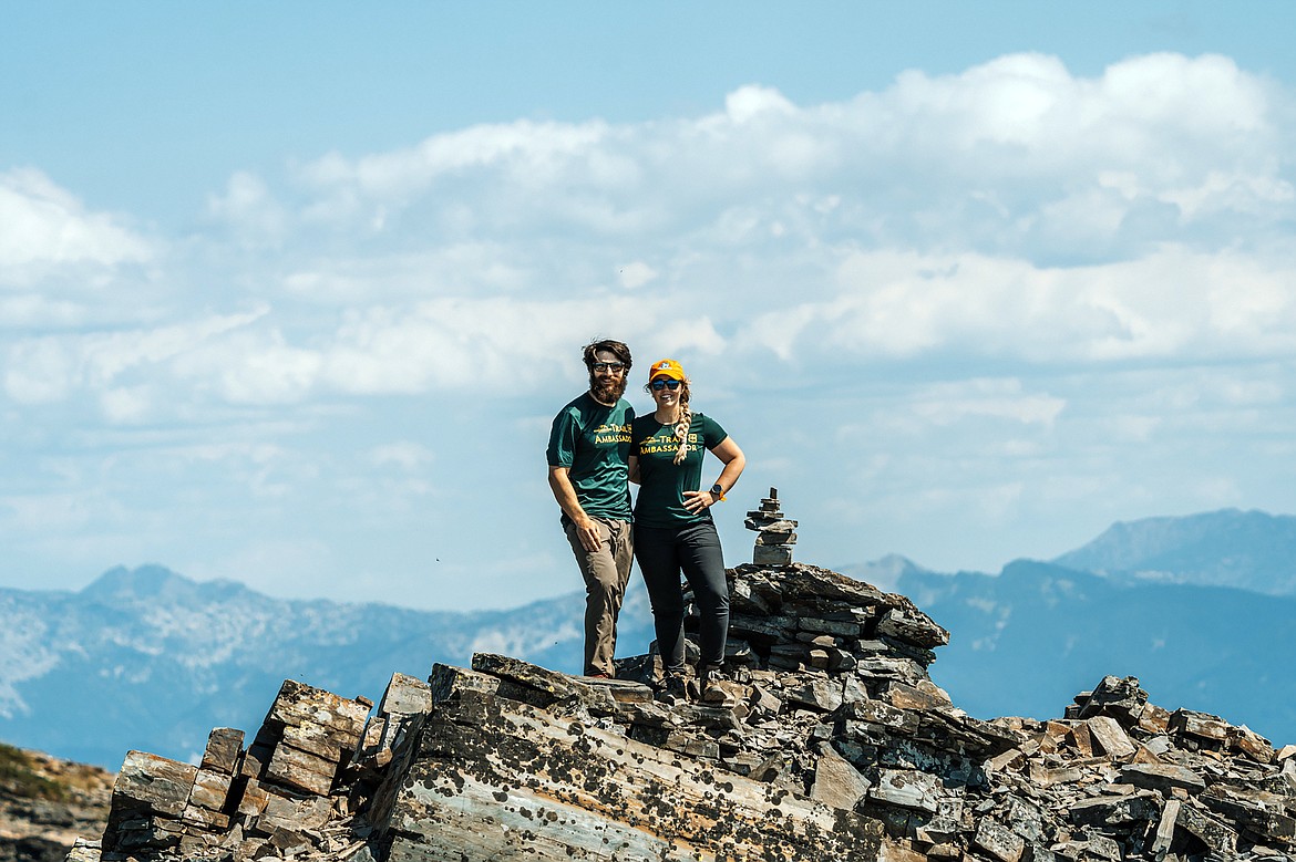 A pair of Scotchman Peaks trail ambassadors pose for a photo.