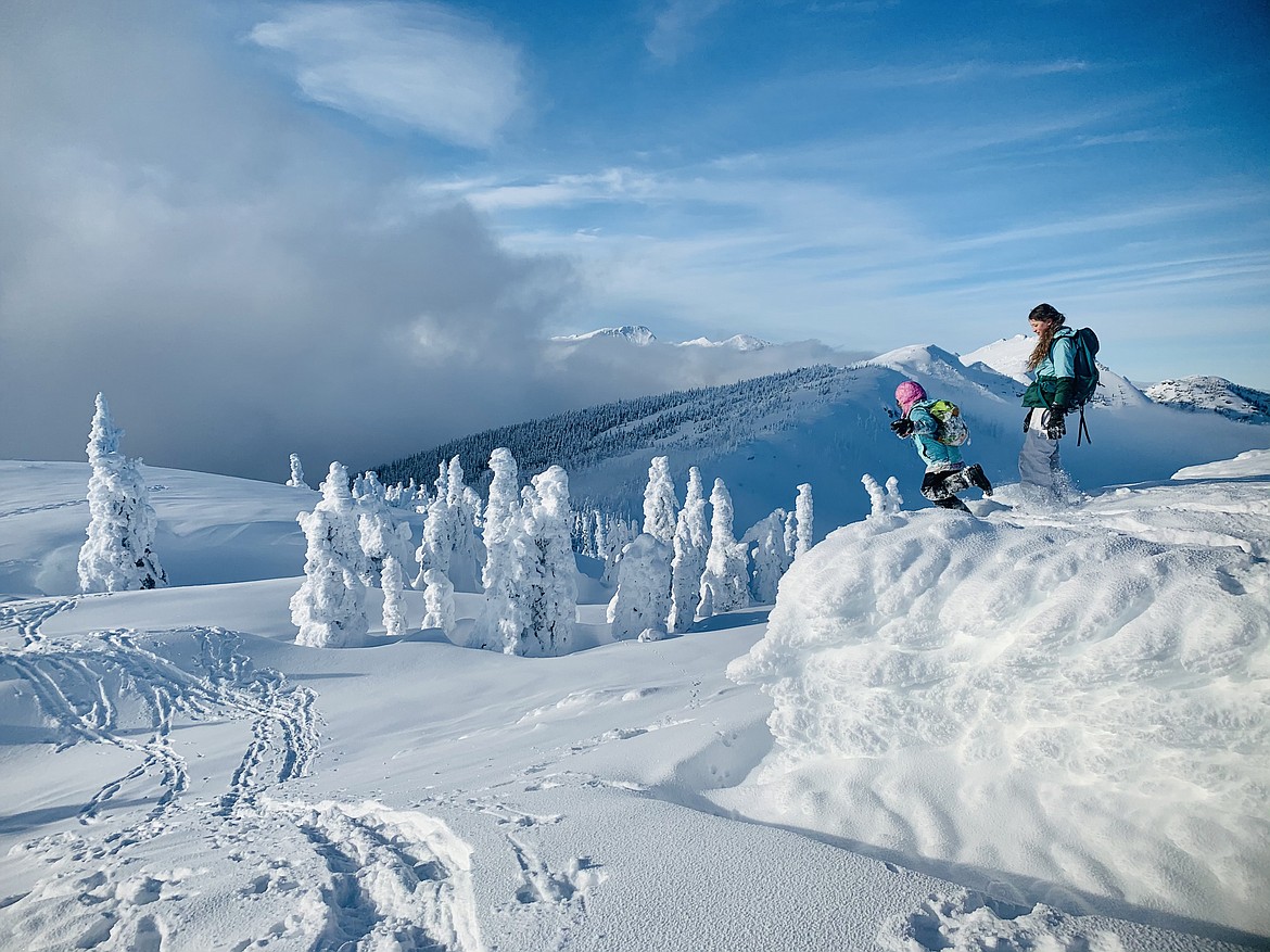 Rebecca Sanchez captures a photo of a jump into the snow on Star Peak in the Scotchman Peaks Wilderness area.