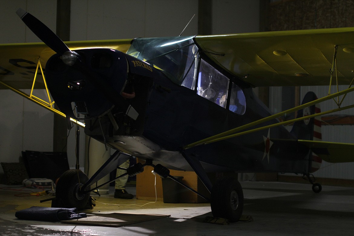 A plane restored by the North Idaho High High School Aerospace program, "Patches," sits in a hanger at the Sandpoint Airport.