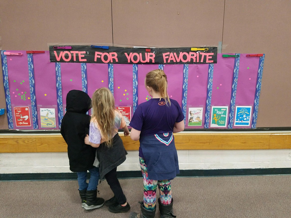 In celebration of Read Across America Day on March 2, Idaho Hill Elementary held several activities including "Mystery Readers Dress Up Day," where students could dress up pas their favorite book character or wear their PJs, "Stop, Drop & Read" and Dr. Seuss trivia.