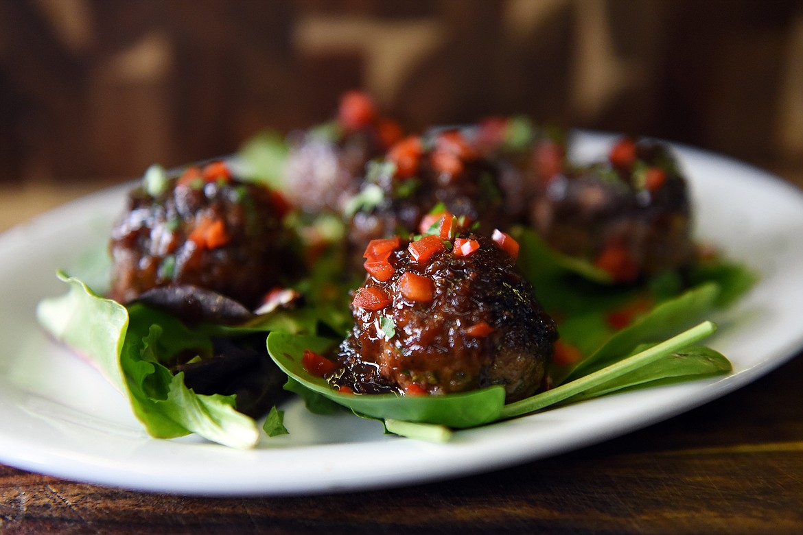 Bison meatballs with a huckleberry jalapeno barbecue sauce by The Chef Guys on Tuesday, March 16. (Casey Kreider/Daily Inter Lake)