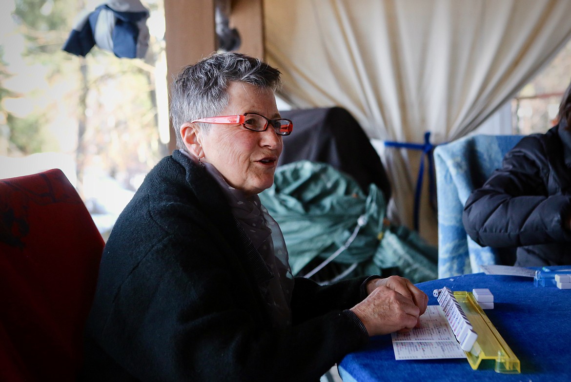 Jan Thompson chats with her friends during a round of mahjong at her Echo Lake home.
Mackenzie Reiss/Bigfork Eagle