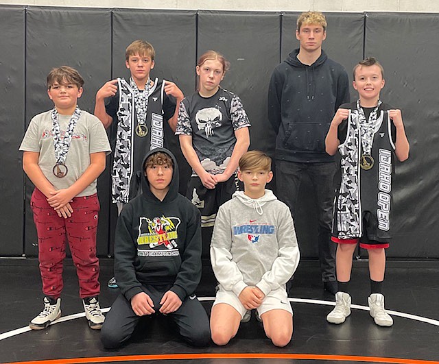 Courtesy photo
Team Real Life wrestlers joined almost 770 other wrestlers in Caldwell for a tournament on March 6-7. Kneeling from left are Ethan Wilson and Rider Seguine, 2nd; and standing from left, Mathew Hamilton, 3rd; Damion Hamilton, champion; Shelby Johnston; Alex Austin, 2nd; Sawyer Sage, champion.