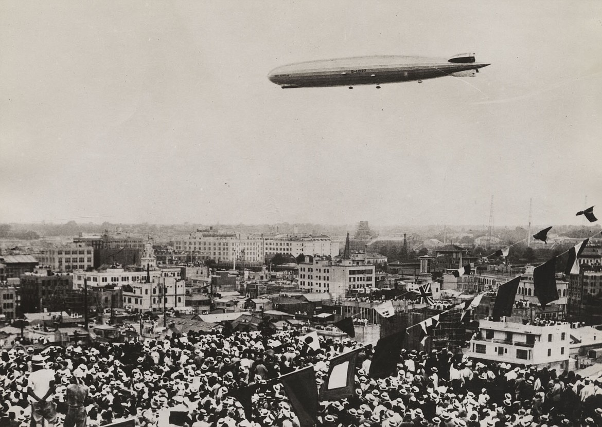 Graf Zeppelin over a huge crowd in Tokyo on a round-the-world tour with Sir Hubert Wilkins on board, the flight half financed by U.S. newspaper magnate William Randolph Hearst (1929).