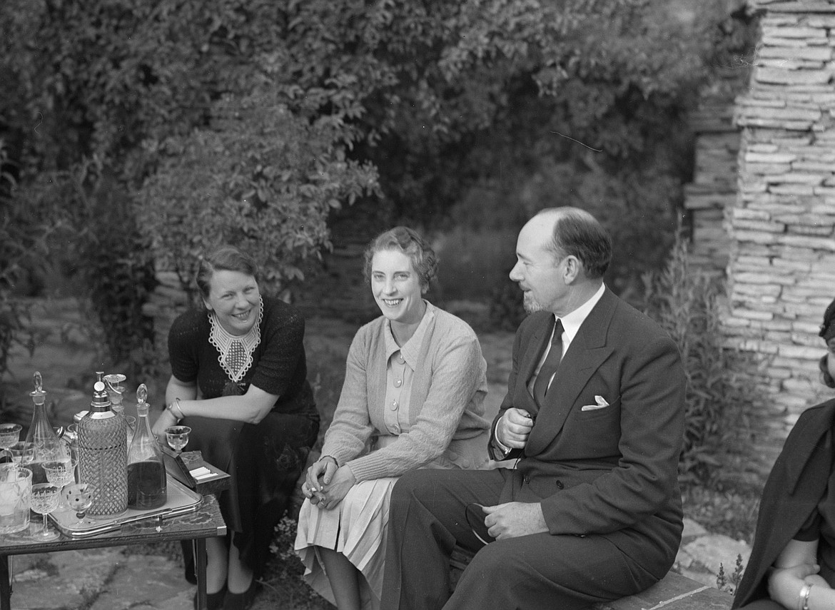 Sir Hubert Wilkins and wife, Australian actress Suzanne Bennett, with Nell Langlais on left, wife of noted Dutch photographer Willem van de Poll, this photo taken in Scotland or England.