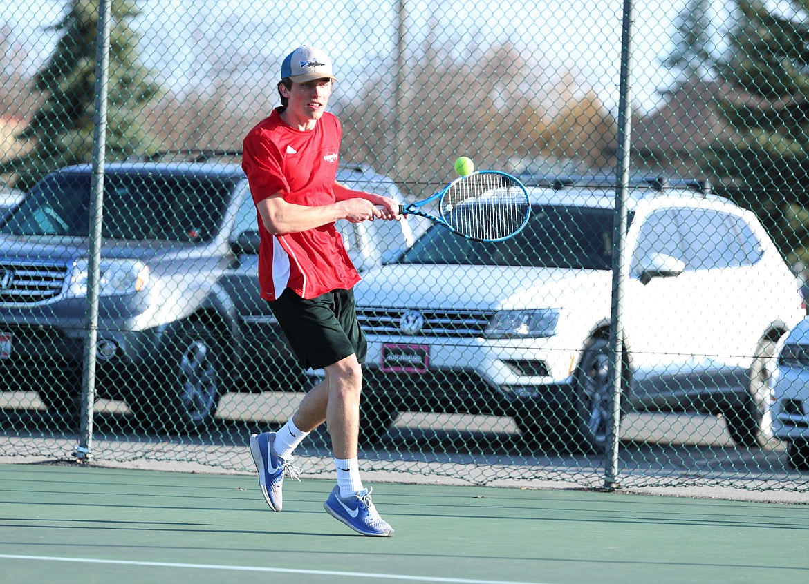 Carter Johnson hits a backhand on Wednesday.