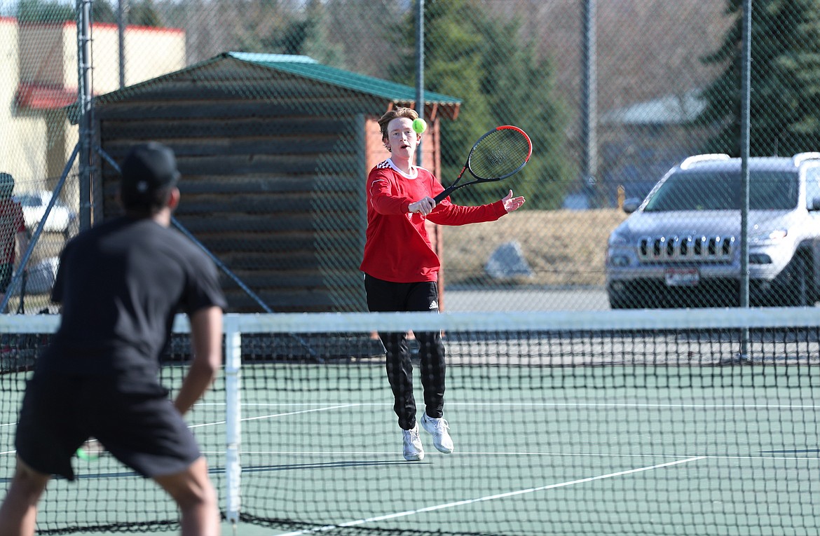 Charlie Johnson attacks the net Wednesday.