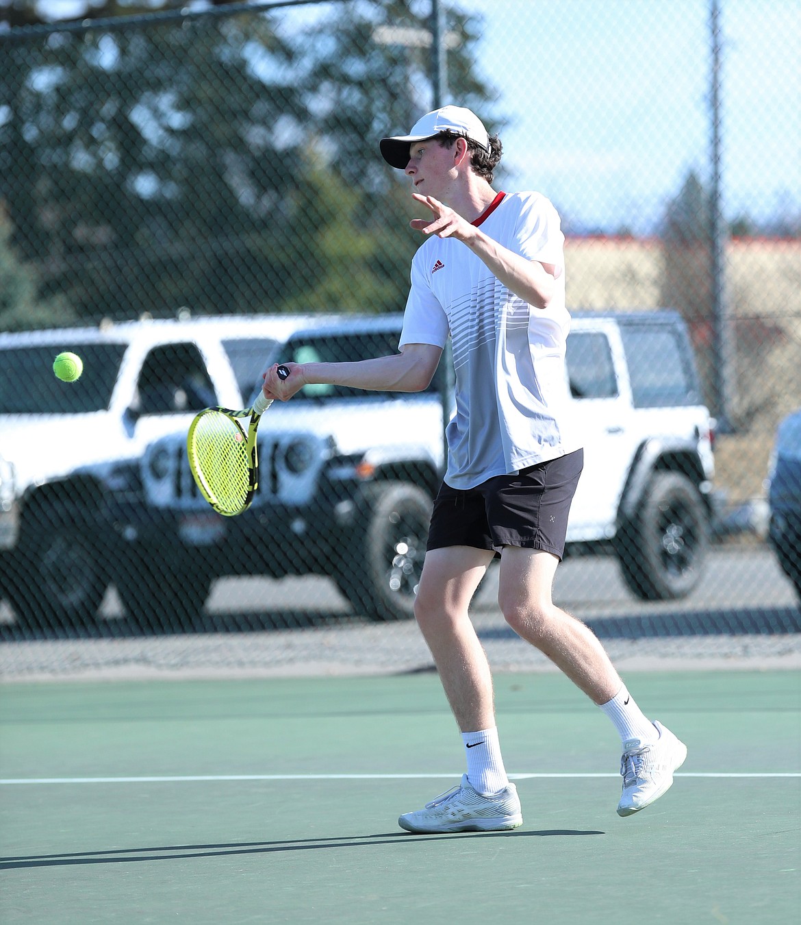 Josh Embree hits a forehand on Wednesday.