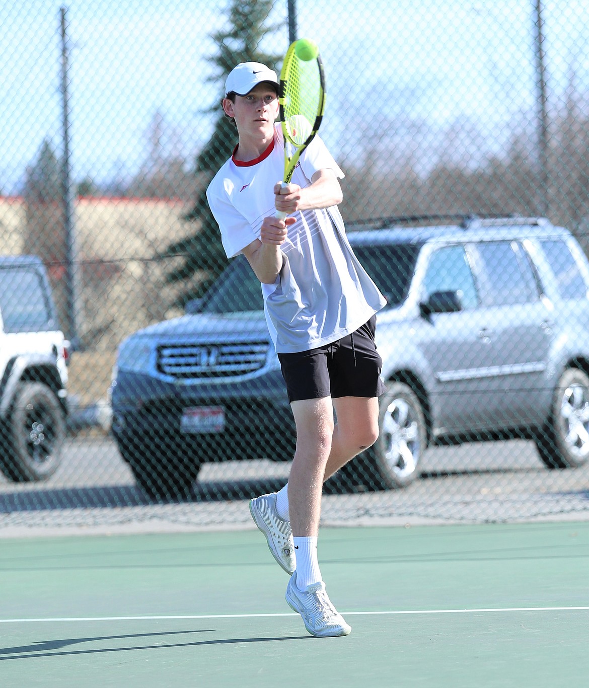 Josh Embree hits a backhand on Wednesday.
