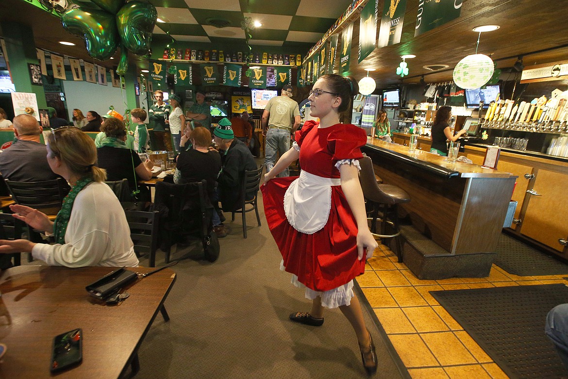Rachel Strawn performs with the Lake City Highland Dancers at Paddy's Sports Bar on St. Patrick's Day on Wednesday.