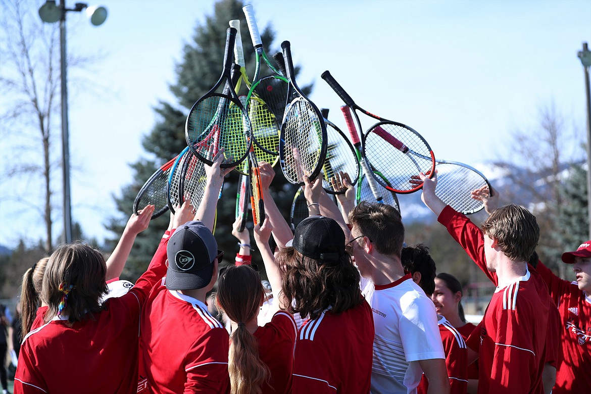 The Sandpoint tennis team huddles up prior to Wednesday's match against Post Falls.