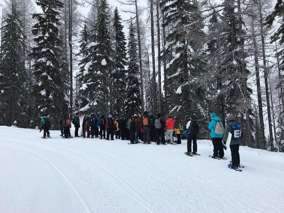 Lake City students snowshoe up Lookout Mountain.