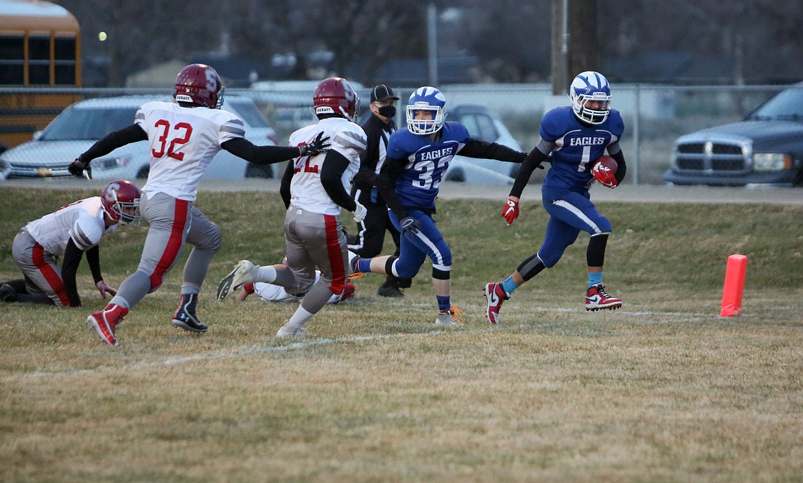 Besim Cassedy makes his way into the end zone for the touchdown in the first half for Soap Lake on Thursday night at Soap Lake High School.