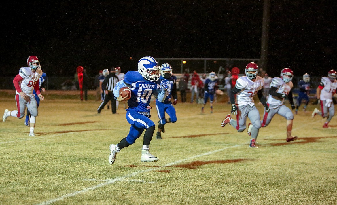 Soap Lake's Alex Bustos makes his way toward the end zone in the second half against Waterville on Thursday night at Soap Lake High School.