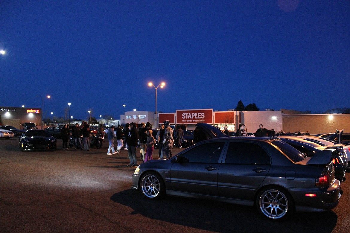 Over 50 cars lined up in the Staples parking lot on North Stratford Road on Saturday for a meetup.
