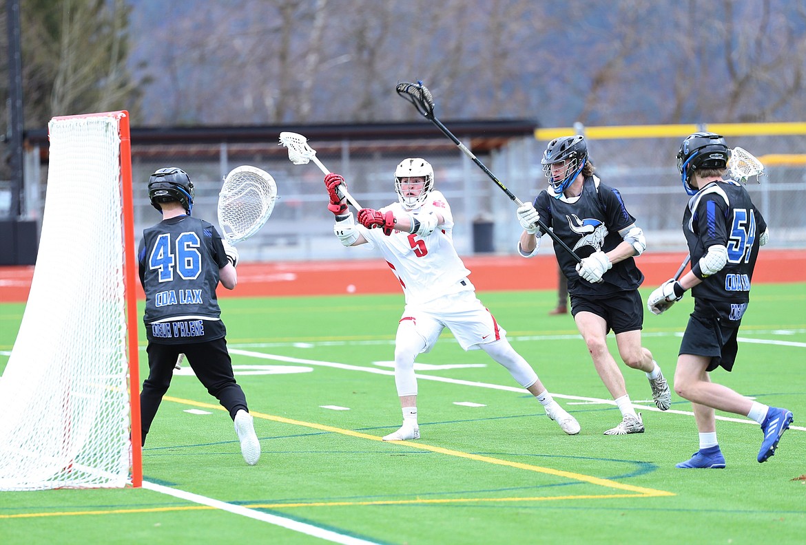 Owen Wimmer attempts a shot just outside the crease on Saturday.