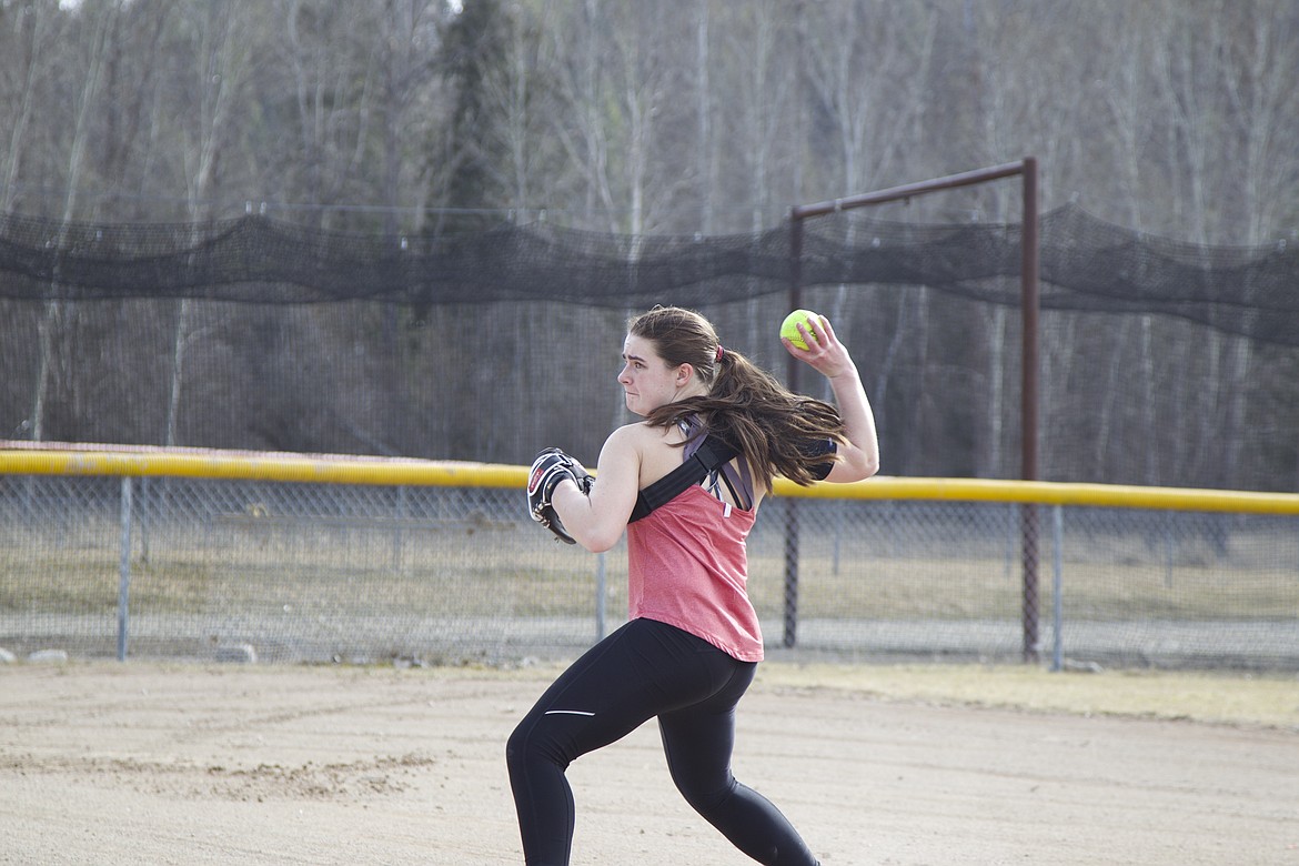 Senior Bethany Thomas launches a softball during practice March 18. (Will Langhorne/The Western News)