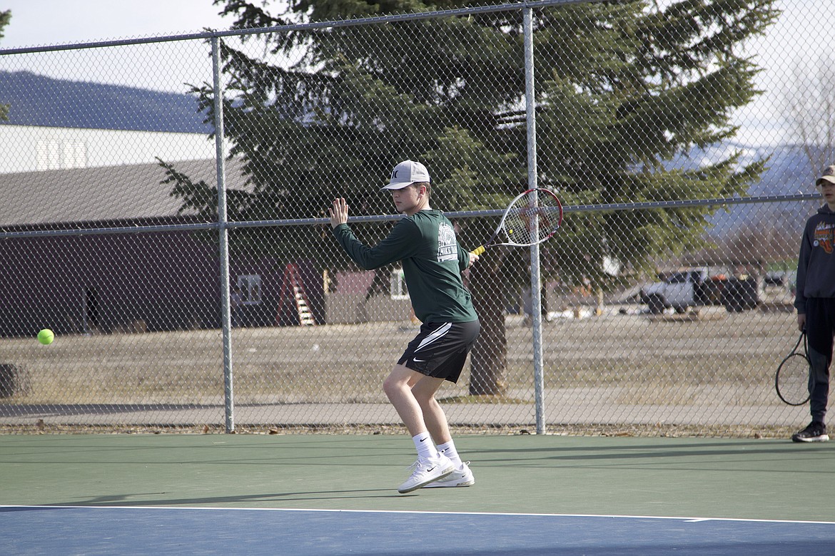 Senior Colton Halvorson winds up for a swing during a March 18 practice. (Will Langhorne/The Western News)