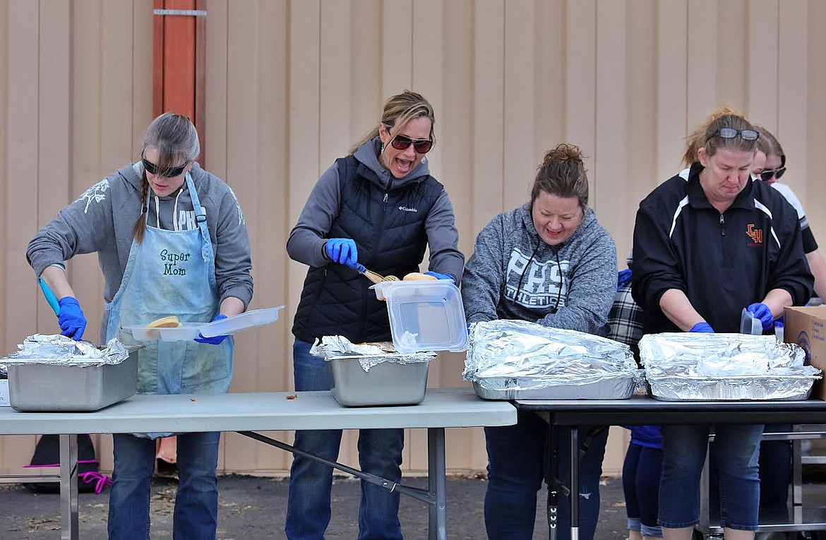 Mothers of Plains softball players showed how their fundraiser is a true team effort. Plains residents turned out in droves to support the Trotters softball team Saturday at the high school. Organizers said the event was a true success. (Photo courtesy Jessica Peterson)