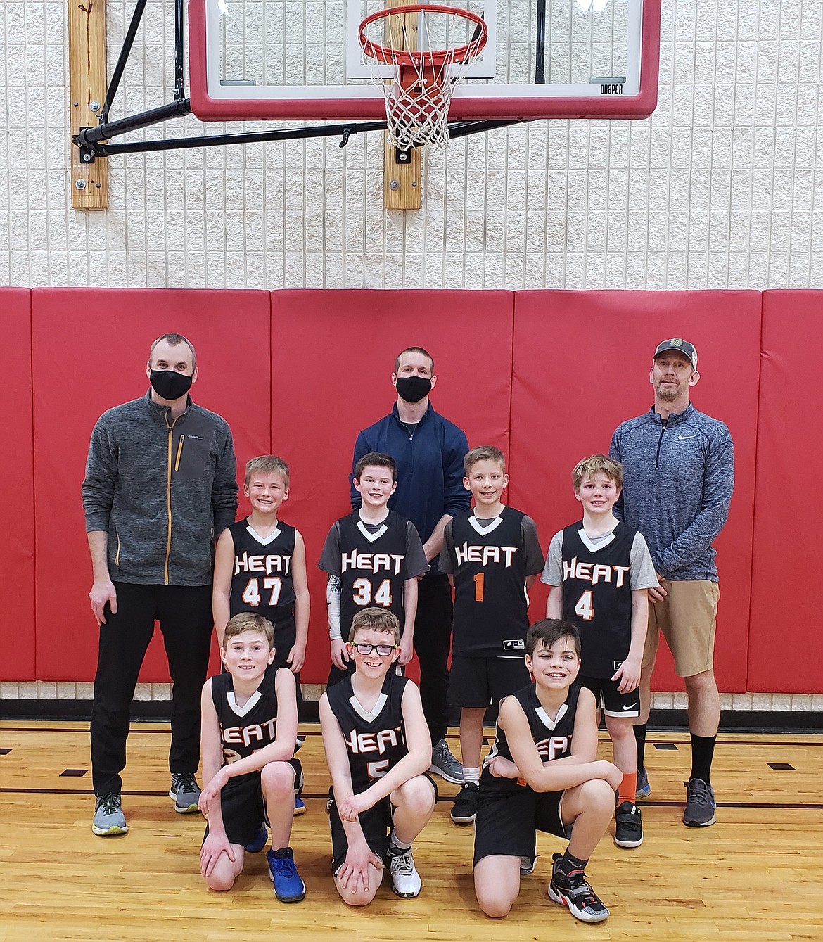 Courtesy photo
The Coeur d'Alene Heat took second place in the third/fourth-grade division at the inaugural Battle of the Rims youth basketball tournament March 13-14. The tourney was played at Canfield Middle School in Coeur d'Alene, put on by the Hayden Recreation and Community Events Department. In the front row from left are Easton Clyne, Caleb Davenport and Drew Murrell; second row from left, Brooks Wearne, Logan Cotant, Jax Pearson and Dean Perkins; and back row from left, coaches Bill Davenport, Zach Perkins and Eric Clyne. Not pictured is Hunter Teuscher.