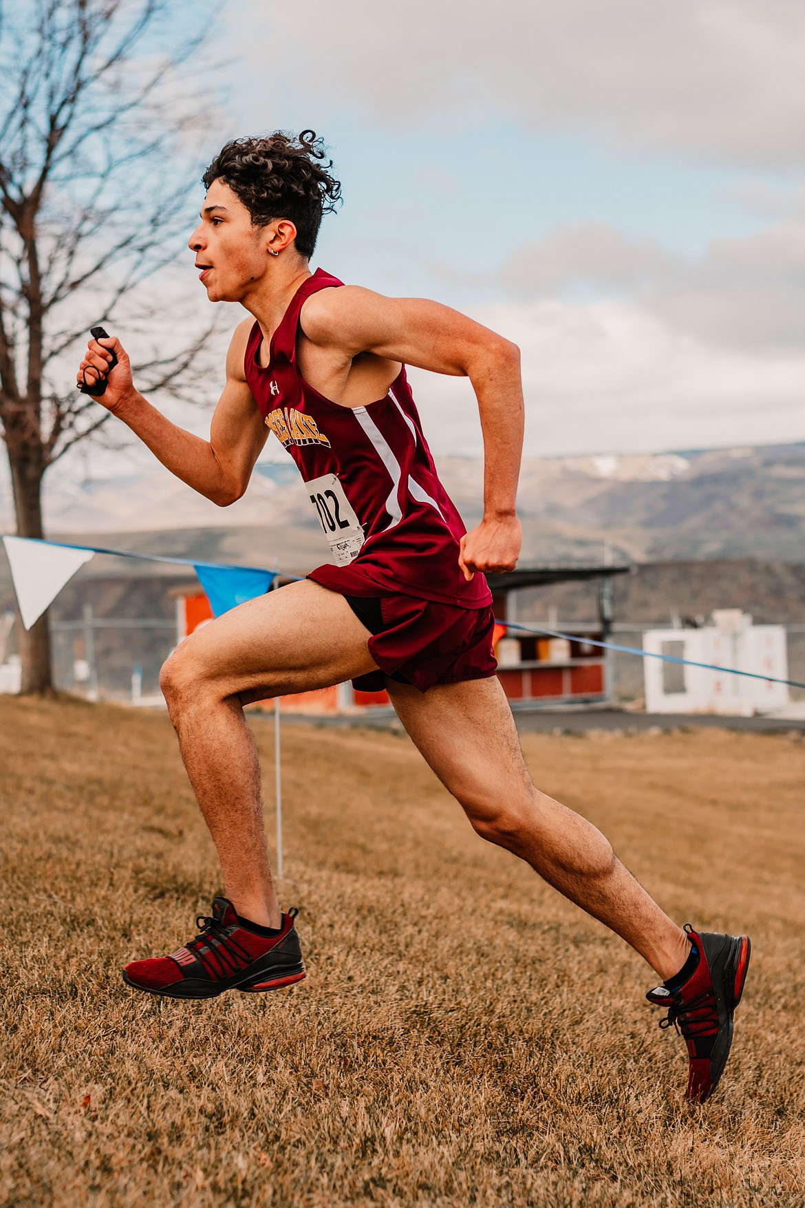Moses Lake junior Elijah Serrano climbs the hill at the Gorge during the 5,000 meter event on Saturday in George.