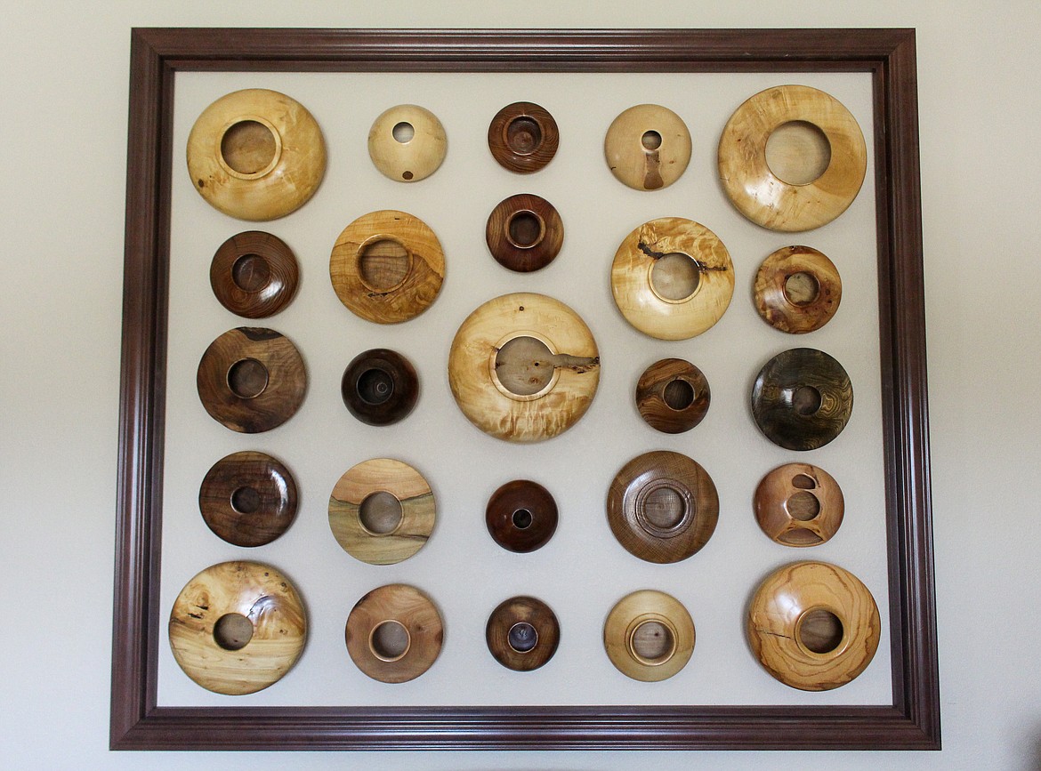 A collection of hollow sphere bowls crafted by Merle Hardy were hung up on the wall in their home as decoration by his wife, Cynthia Hardy.