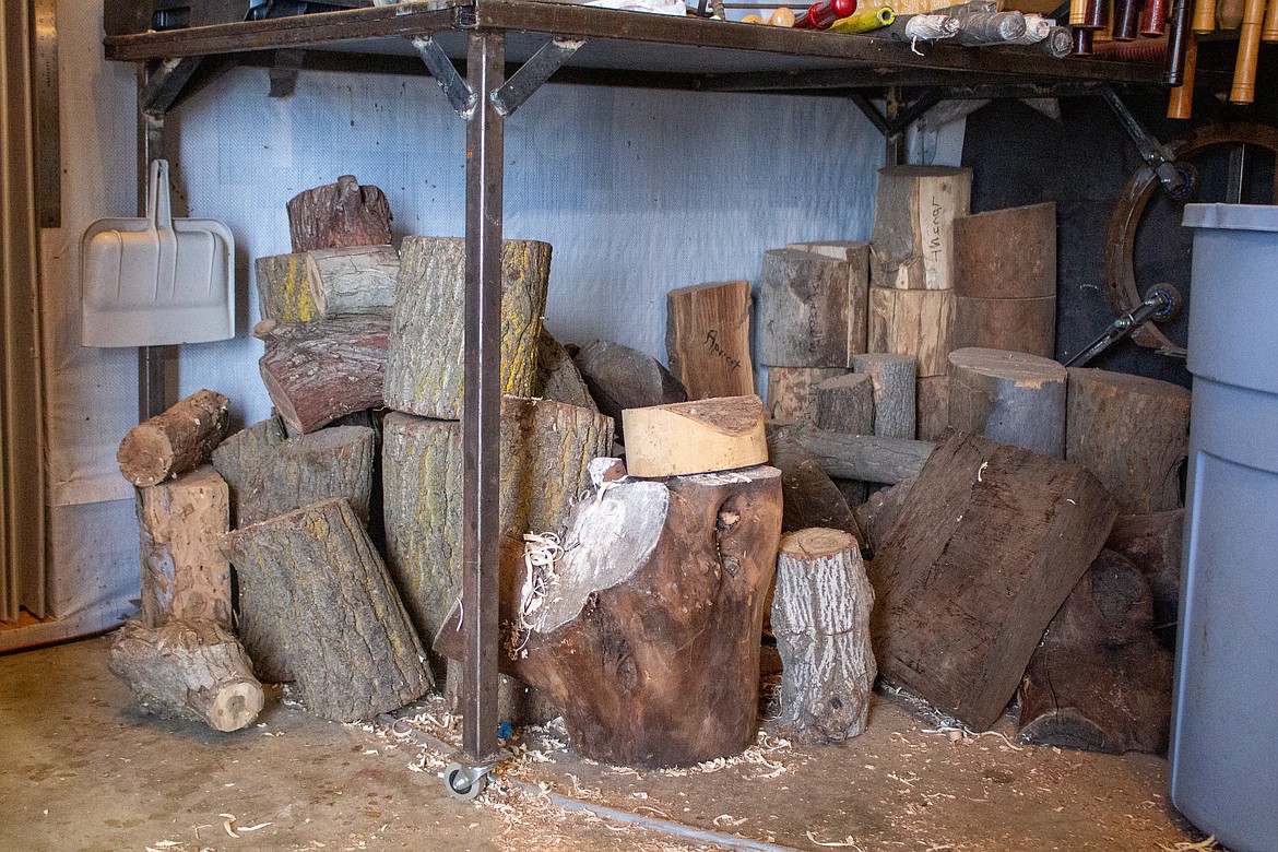 A variety of different types of wood sit ready to go in Merle Hardy's wood shop area of his garage in Moses Lake on Monday afternoon.