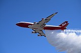 Beating wildfires: Global Supertanker dumps water over Moses Lake