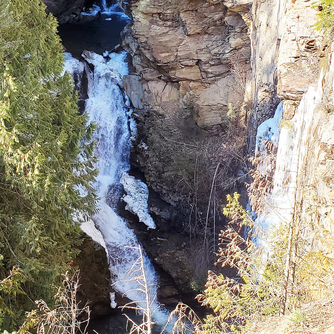 Myrtle Creek awakens in the springtime as the ice in Myrtle Creek Falls starts to melt.