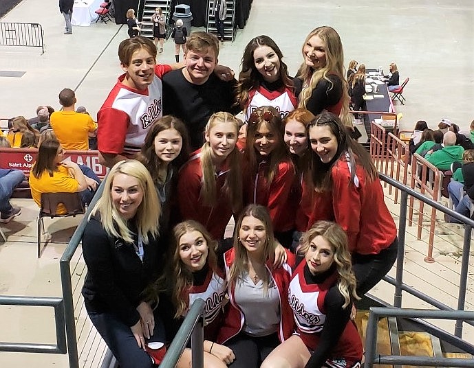 The Sandpoint High School cheer team poses for a photo at the 4A state championships.