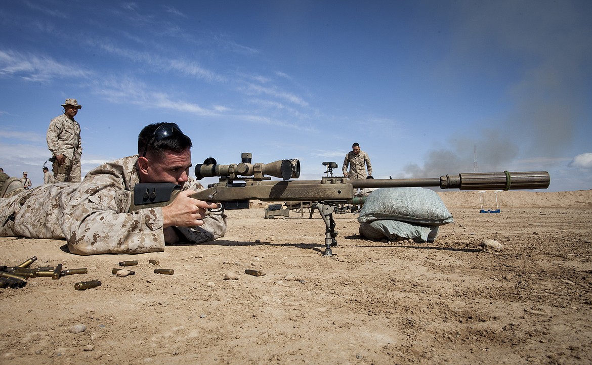 U.S. Marine Corps 1st Lt. Nathan M. Brown, Regimental Combat Team 7, at live-fire range in Helmand province, Afghanistan (2013).