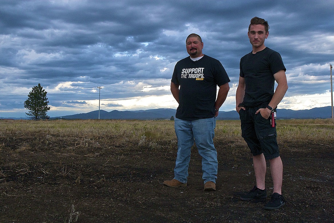 RALPH BARTHOLDT/Press
Coeur d’Alene attorney Kinzo Mihara and University of Idaho student Matthew Suhr were among the first people to arrive at a helicopter crash site south of Rathdrum on June 23, 2020.