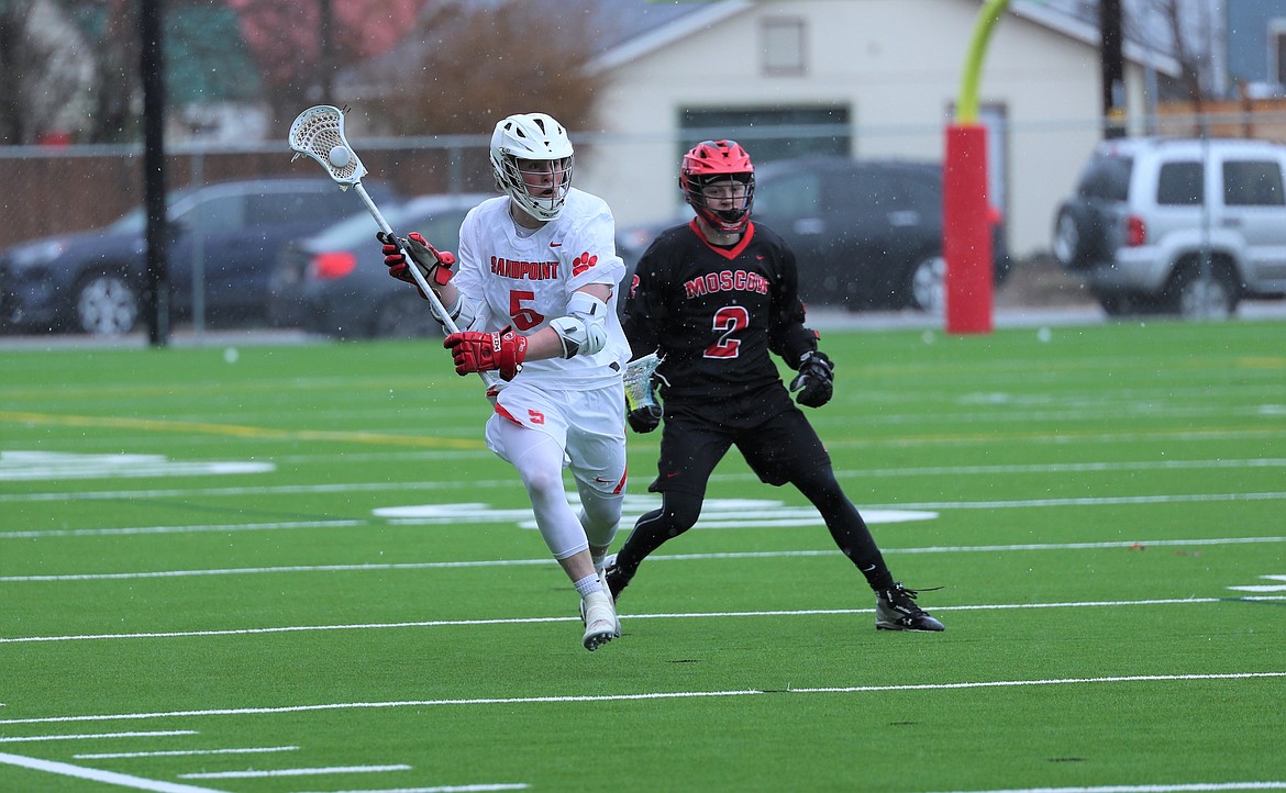 Owen Wimmer crosses midfield and brings the ball upfield on Wednesday.