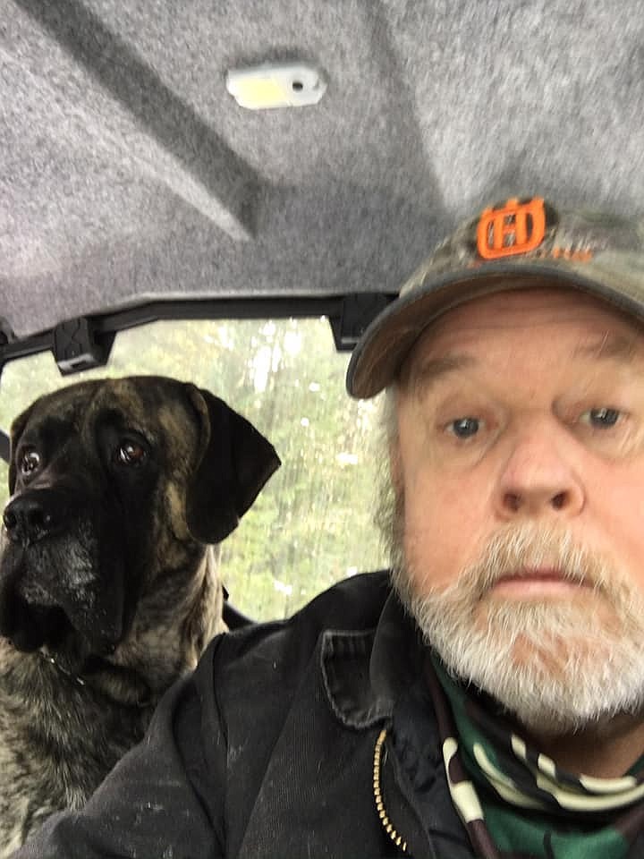 John Hantz and his bull mastiff Chester. A concerned neighbor reported Hantz missing on March 23 after he headed into the Lincoln County backcountry with Chester. Rescuers found Hantz in safe condition the following day. (Photo courtesy of Rachel Hantz)