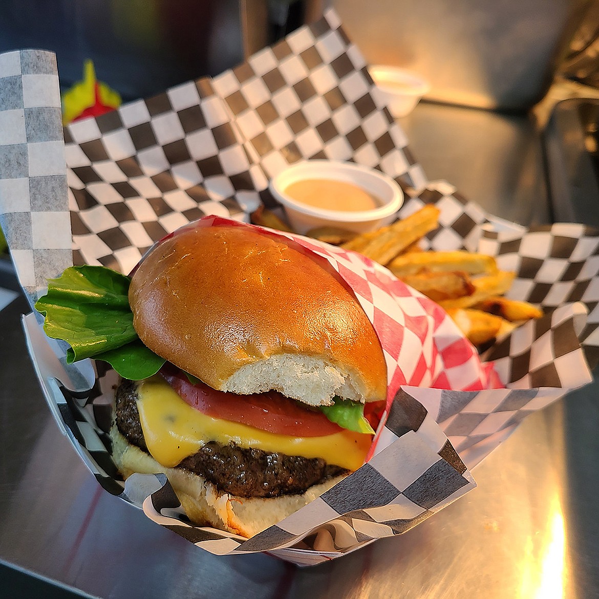 The Wagyu Wagon's most popular menu item, a Wagyu beef burger with special family recipe sauce.