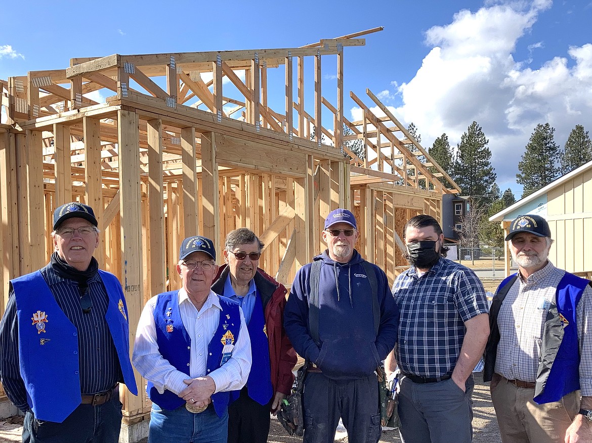 The Knights of Columbus Post Falls Council 12560 donated $1,000 to Habitat For Humanity
in Coeur d'Alene, to help build homes, making it easier for low income families
to become first time homeowners.  
From left is Dave Krell, Lance Stephens, Leonard Kenne, Construction Manager Greg Nowak, Executive Director James Casper and Paul Wagner.