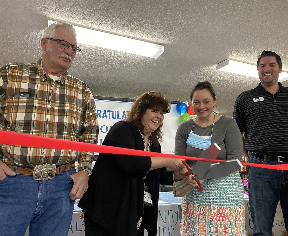 The Rathdrum Community Center ribbon-cutting ceremony symbolized years of hard work and a bright future for Rathdrum residents. From left: Wayne Dust, Rathdrum Community Center Director Rhonda Story, Nicole South and Kyle Janke. (MADISON HARDY/Press)