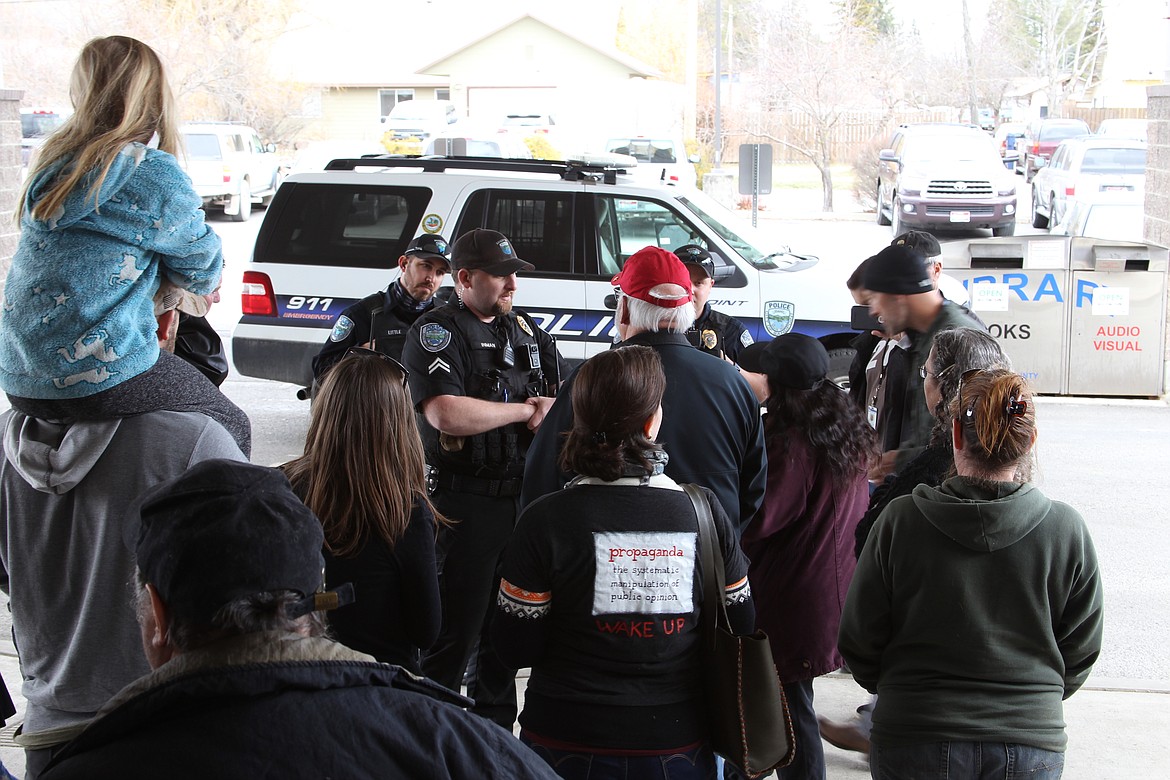 Opponents of the East Bonner County Library's mask mandate peacefully protested on Saturday at the Sandpoint Library. (Photo by KEITH KINNAIRD)