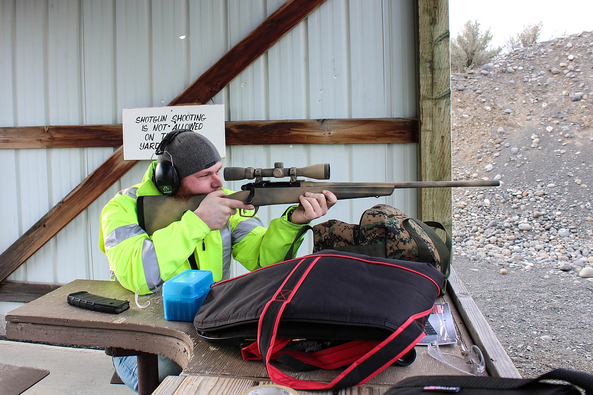 Ephrata Sportsmen's Association member Robert Thompson aims his rifle at the Boyd Mordhorst Memorial Range on Saturday.