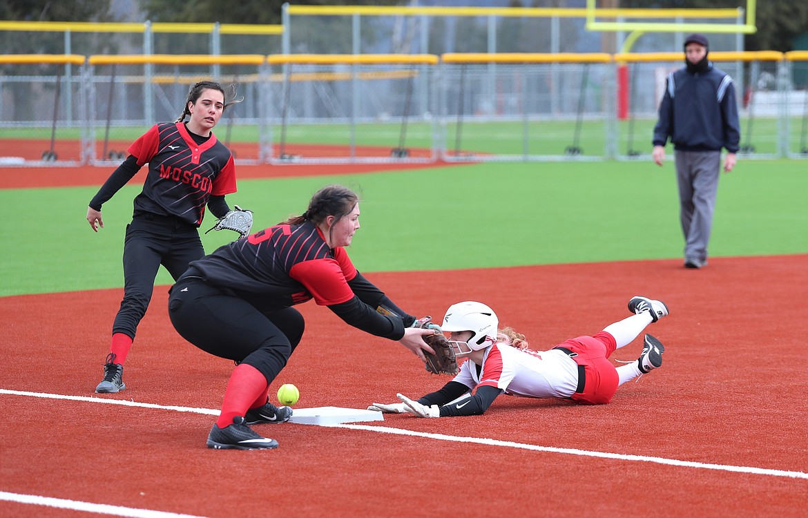 Jaidyn Inman slides headfirst into third base on Saturday.