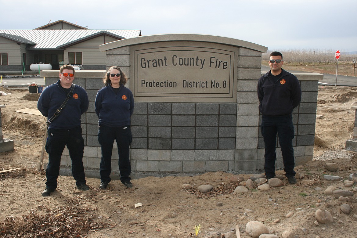 Grant County Fire District 8 personnel (from left) Geoff Hudson, Barbara Davis and Jose Cruz at the district's new fire station. It's scheduled to open in early May.