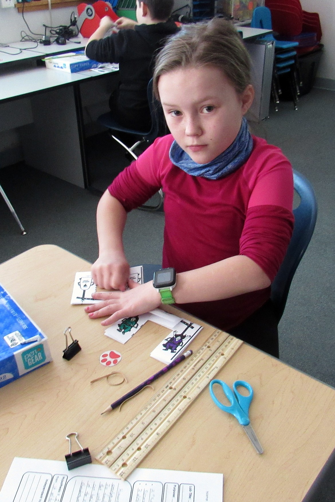 An Idaho Hill fourth-grader participates in the "Twist-O-Matic Challenge" during the school's recent STEaM (science, technology, engineering, art, math) activity.