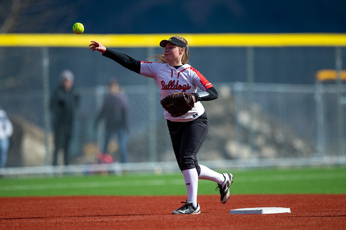 Riley Cessna makes a throw to first base on Tuesday.