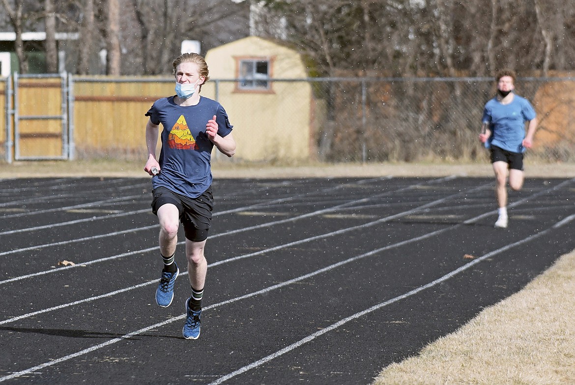 Whitefish's Azure Stolte runs on the track during practice on Monday. (Whitney England/Whitefish Pilot)