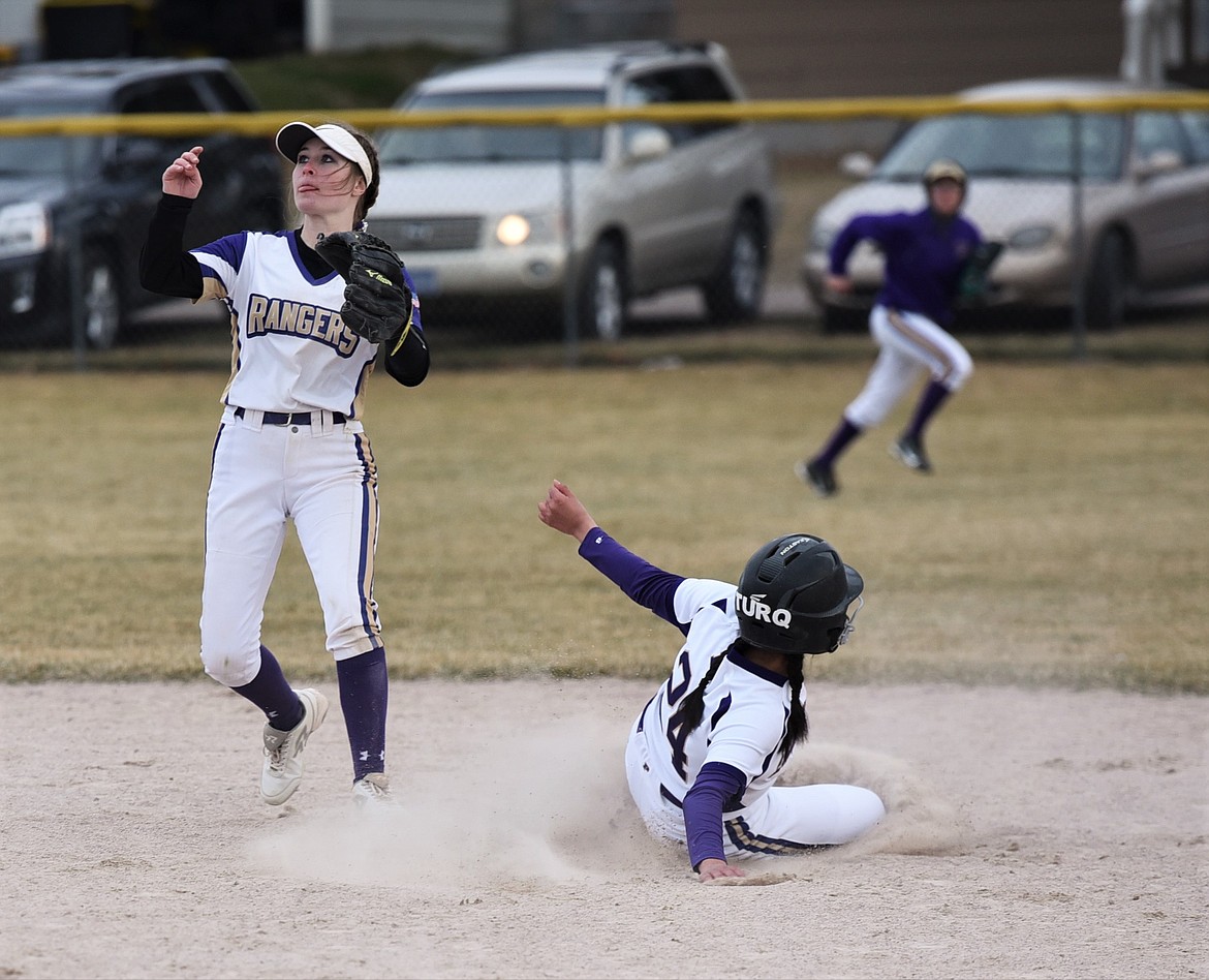 Turquiose Pierre steals second base against Park County. (Scot Heisel/Lake County Leader)