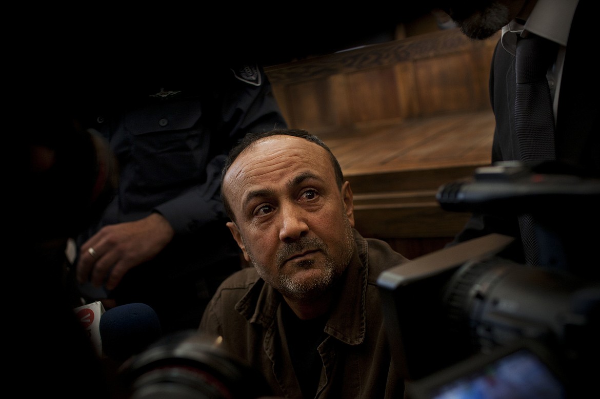 In this file photo taken Jan. 25, 2012, senior Fatah leader Marwan Barghouti appears at Jerusalem's court. Supporters of the popular Palestinian leader jailed by Israel say he will back his own parliamentary list in May elections. The last-minute shakeup late Wednesday, March 31, 2021 could severely weaken President Mahmoud Abbas’ Fatah party and help his militant Hamas rivals.