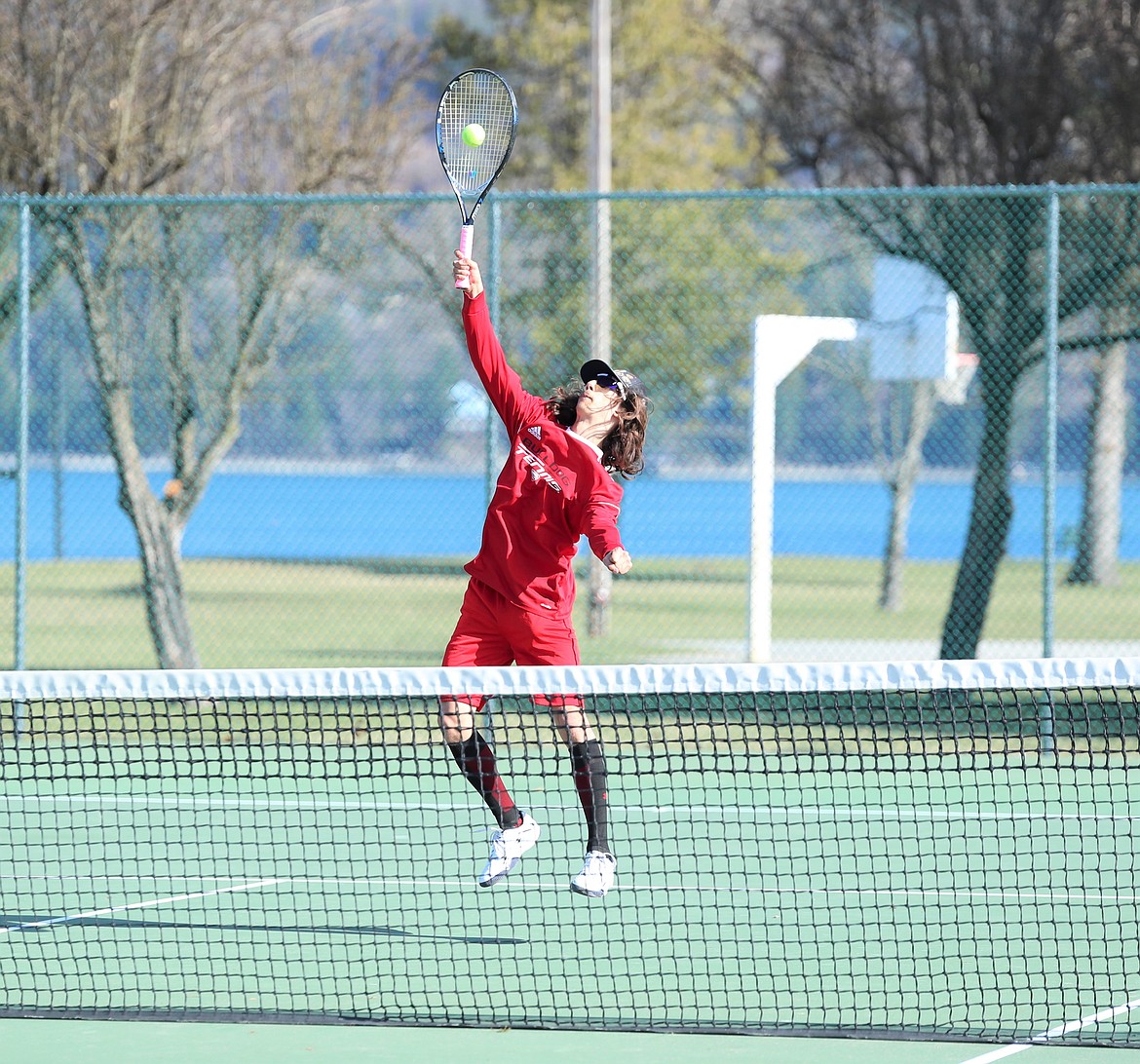 Aden Heitz hits a volley on Wednesday.